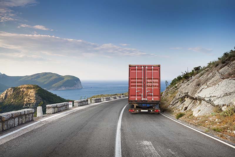 Semi hauling freight on mountain highway